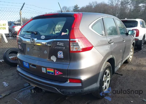 2015 Honda Cr-V Lx z USA, uszkodzony, nr VIN 2HKRM4H31FH691407